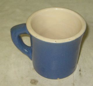 678f - 1blue Pottery Mug With Uhl Pottery Stamped On The Base,  3/16 Inch Chip On