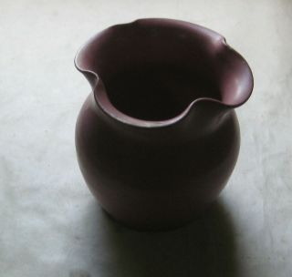 558f - 1 Maroon Flared Pottery Vase Four Inches In Height