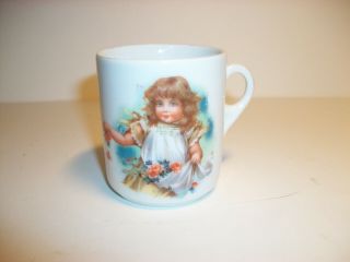 Antique Porcelain Child Cup Mug With Little Curly Hair Girl Apron Full Of Roses