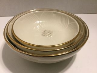 A Set Of Three Small Nested Bowls/dishes By Lenox China With Gold Trim